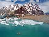 11 Green Glacial Lake On Upper Baltoro Glacier With Mitre Peak Behind There was a large green glacial lake on the Upper Baltoro Glacier with Mitre Peak behind, as we trekked towards Shagring Camp.